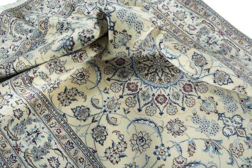 Surface texture of New Nain rug with natural Wool and intricate pattern