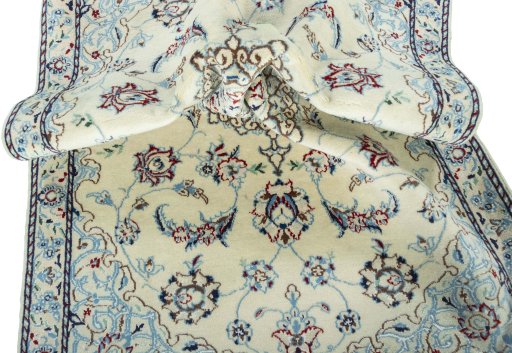 Close-up detail of 2000s Nain rug from Iran / Persia showing Wool weave