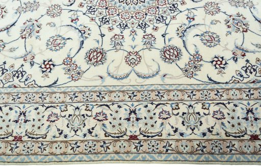Corner detail of New Nain rug showing border pattern and Wool pile