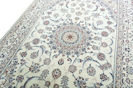 Backside of handmade New Nain rug showing knot structure and weave density