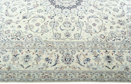 Corner detail of New Nain rug showing border pattern and Wool pile
