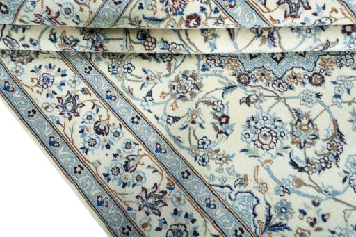 Close-up detail of 2000s Nain rug from Iran / Persia showing Wool weave