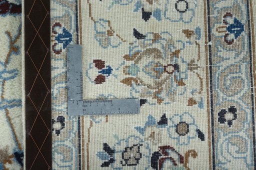 Backside of handmade 2000s Nain rug showing knot structure and weave density