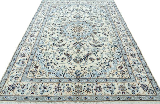 Surface texture of 2000s Nain rug with natural Wool and intricate pattern