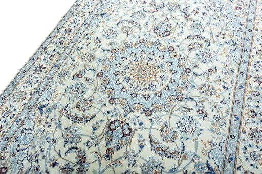 Backside of handmade 2000s Nain rug showing knot structure and weave density