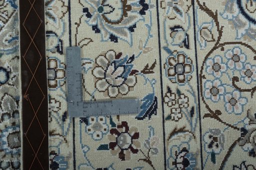 Backside of handmade 2000s Nain rug showing knot structure and weave density
