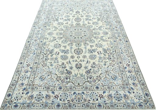 Surface texture of 2000s Nain rug with natural Wool and intricate pattern