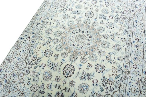 Backside of handmade 2000s Nain rug showing knot structure and weave density