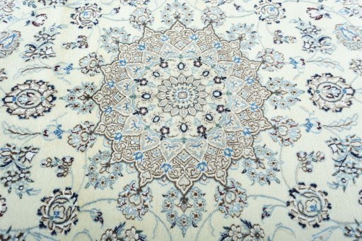 Central medallion detail of 2000s Nain rug from Iran / Persia