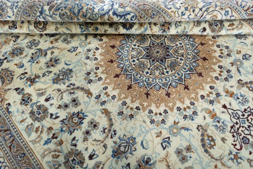 Close-up detail of 2000s Nain rug from Iran / Persia showing Wool weave