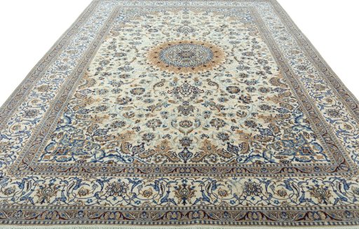 Surface texture of 2000s Nain rug with natural Wool and intricate pattern