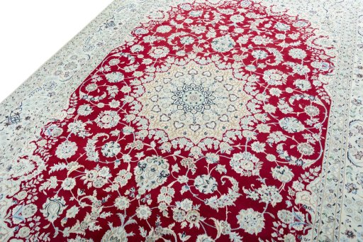 Backside of handmade New Nain rug showing knot structure and weave density