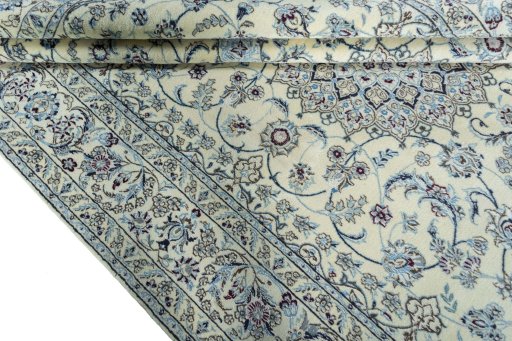 Close-up detail of 2000s Nain rug from Iran / Persia showing Wool weave