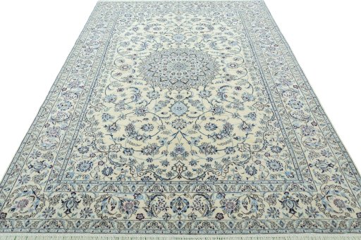 Surface texture of 2000s Nain rug with natural Wool and intricate pattern