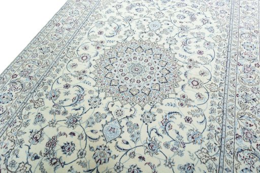 Backside of handmade 2000s Nain rug showing knot structure and weave density