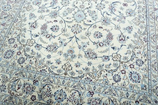 Close-up detail of 2000s Nain rug from Iran / Persia showing Wool weave