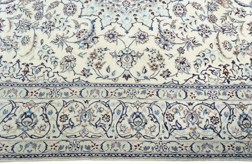 Corner detail of New Nain rug showing border pattern and Wool pile