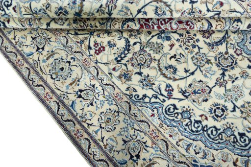 Close-up detail of 2000s Nain rug from Iran / Persia showing Wool weave