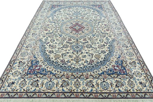 Surface texture of 2000s Nain rug with natural Wool and intricate pattern
