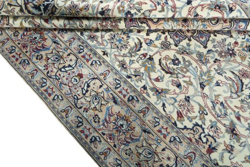 Close-up detail of 2000s Nain rug from Iran / Persia showing Wool weave