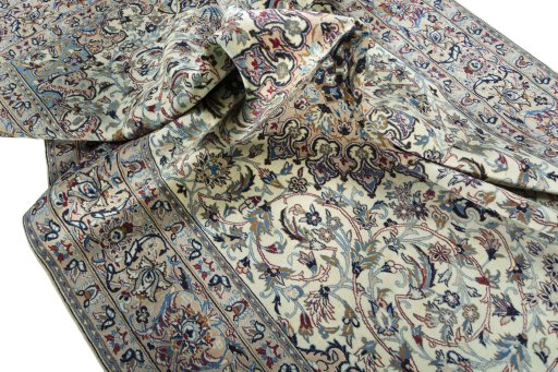Surface texture of 2000s Nain rug with natural Wool and intricate pattern