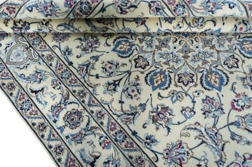 Close-up detail of 2000s Nain rug from Iran / Persia showing Wool weave