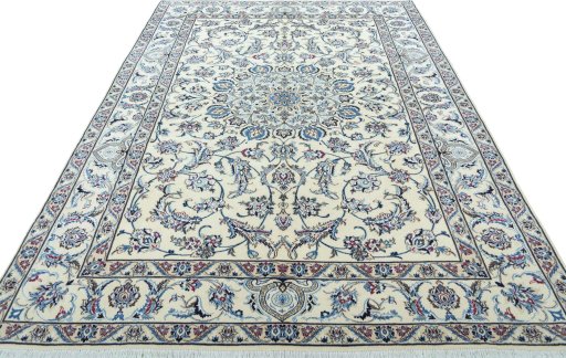 Surface texture of 2000s Nain rug with natural Wool and intricate pattern