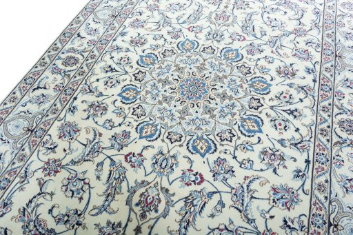 Backside of handmade 2000s Nain rug showing knot structure and weave density