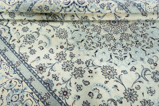 Close-up detail of 2000s Nain rug from Iran / Persia showing Wool weave
