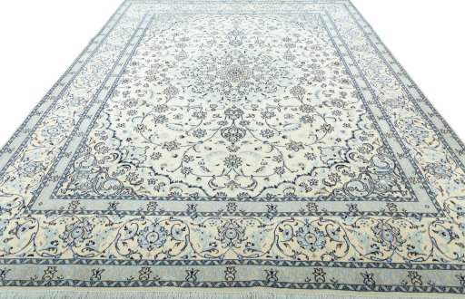 Surface texture of 2000s Nain rug with natural Wool and intricate pattern