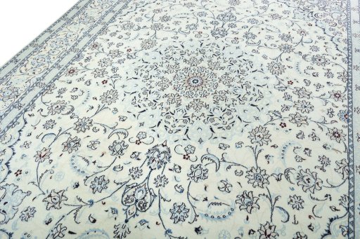 Backside of handmade 2000s Nain rug showing knot structure and weave density