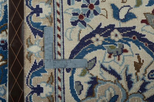 Backside of handmade 2000s Nain rug showing knot structure and weave density