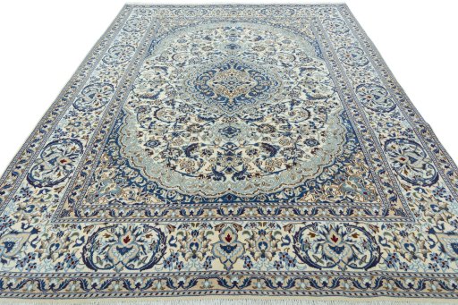 Surface texture of 2000s Nain rug with natural Wool and intricate pattern