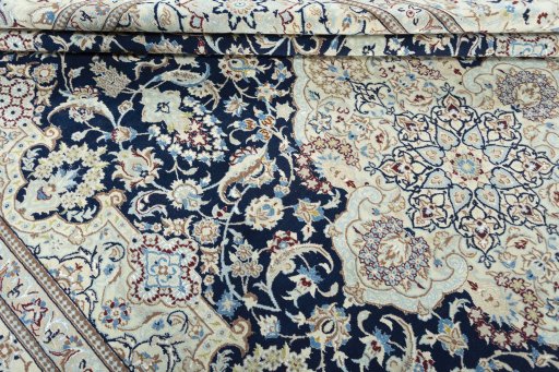 Close-up detail of 2000s Nain rug from Iran / Persia showing Wool weave