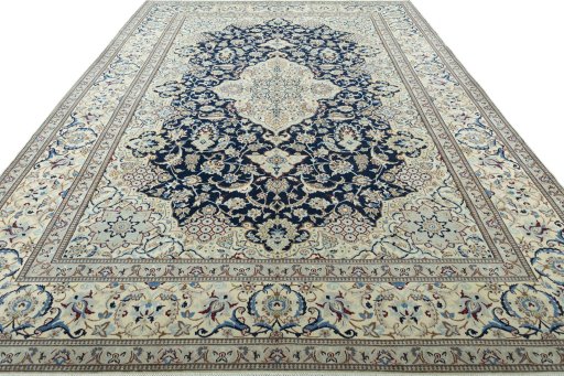 Surface texture of 2000s Nain rug with natural Wool and intricate pattern