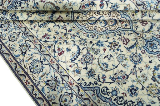 Close-up detail of 2000s Nain rug from Iran / Persia showing Wool weave