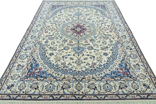 Surface texture of 2000s Nain rug with natural Wool and intricate pattern
