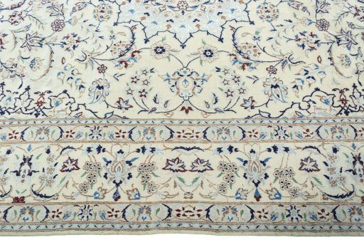 Corner detail of 2000s Nain rug showing border pattern and Wool pile