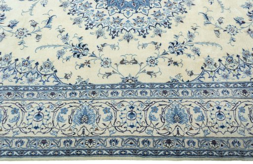 Corner detail of New Nain rug showing border pattern and Wool pile