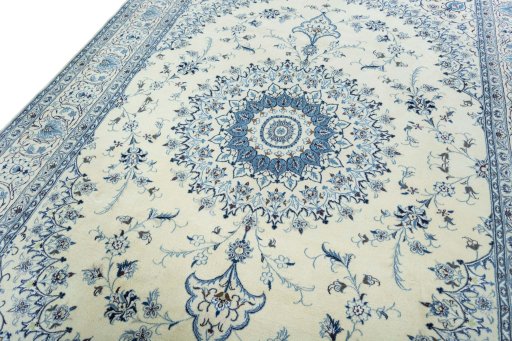 Backside of handmade New Nain rug showing knot structure and weave density