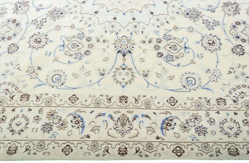 Corner detail of New Nain rug showing border pattern and Wool pile