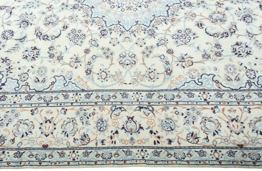 Corner detail of New Nain rug showing border pattern and Wool pile