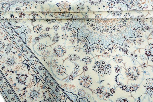 Close-up detail of New Nain rug from Iran / Persia showing Wool weave