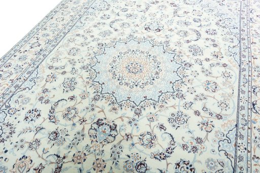 Backside of handmade New Nain rug showing knot structure and weave density