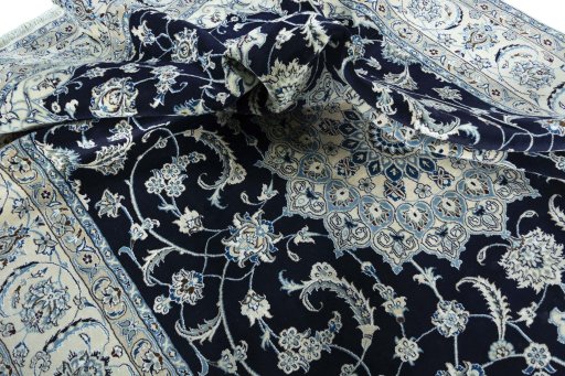 Surface texture of New Nain rug with natural Wool and intricate pattern