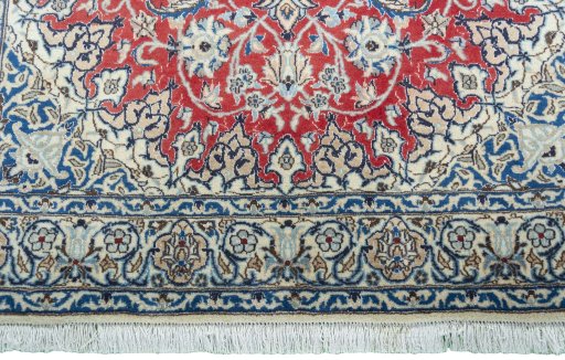 Close-up detail of New Nain rug from Iran / Persia showing Wool weave