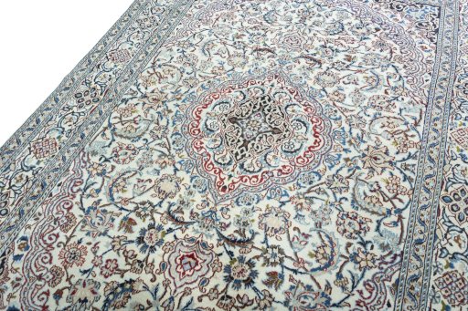 Backside of handmade 2000s Nain rug showing knot structure and weave density
