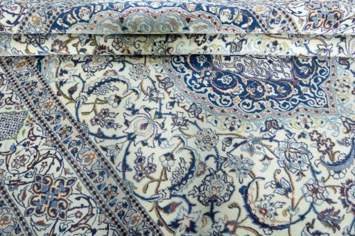 Close-up detail of 2000s Nain rug from Iran / Persia showing Wool weave