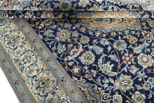 Close-up detail of 2000s Nain rug from Iran / Persia showing Wool weave
