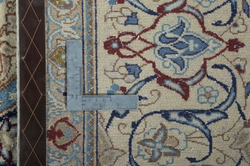Backside of handmade 2000s Nain rug showing knot structure and weave density